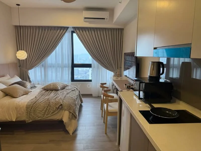 Bedroom features: queen-size bed with beige bedding, upholstered headboard, 2 wooden dining chairs, wall-mounted air conditioning unit, floor-to-ceiling windows with sheer curtains, wooden flooring, decorative pendant light, nightstand with lamp, kitchenette with countertop, microwave, electric kettle, stainless-steel frying pan; style: modern; view: city.