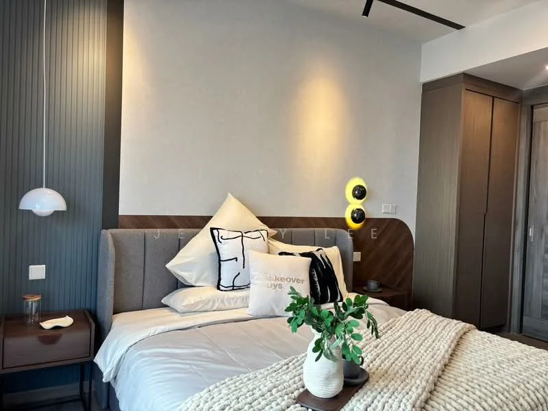 Bedroom features: king-size bed with upholstered headboard, white bedding with decorative pillows, wooden bedside table, table lamp with white shade, wall-mounted reading lights, textured accent wall in dark grey, light grey painted walls, built-in wardrobe with sliding doors, decorative plant on bedside table, woven throw blanket on bed; style: modern.