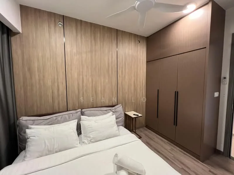 Bedroom features: queen-size bed with white bedding, wooden accent wall, built-in wardrobe with sliding doors, nightstand with lamp, ceiling fan, laminate flooring, grey curtains, decorative pillows; style: modern.