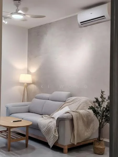 Living features: light grey fabric sofa, wooden coffee table, floor lamp with white shade, 1 wall-mounted split AC, light grey accent wall, light wood flooring, decorative plant in pot, throw blanket draped over sofa, ceiling fan with light; style: modern.