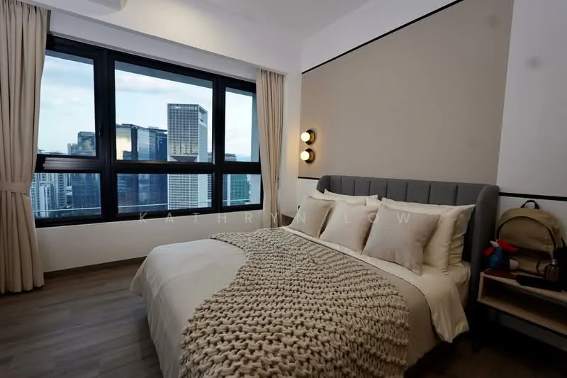 Bedroom features: king-size bed, upholstered headboard, bedding in neutral tones, decorative throw blanket, wooden bedside table, table lamp, floor-to-ceiling windows, curtains, wooden flooring, city skyline view; style: modern; view: city.