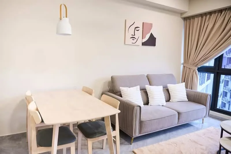 Living features: grey fabric sofa, 4-seater dining table, wooden dining chairs, decorative artwork on wall, sheer curtains, floor-to-ceiling windows, light fixture with pendant lamp, area rug; style: modern.