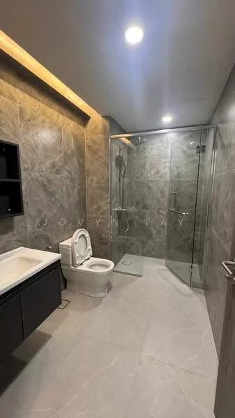 Bathroom features: grey marble tile walls, light grey tile flooring, glass shower enclosure, rain shower head, handheld shower, single-sink vanity with black cabinetry, white toilet, recessed LED downlights, mirror above vanity, chrome faucet; style: modern.