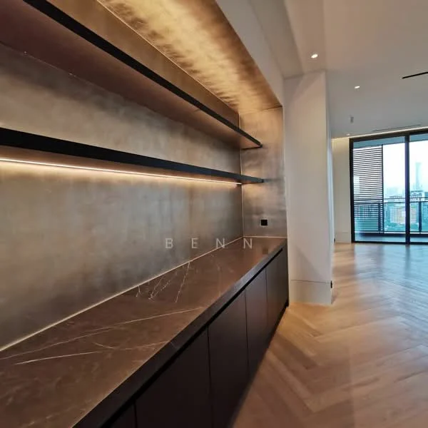 Room features: gold metallic feature wall, floating shelves, marble countertop, dark wood cabinetry, recessed LED lighting, herringbone wood flooring, floor-to-ceiling windows, city skyline view; style: modern; view: city.