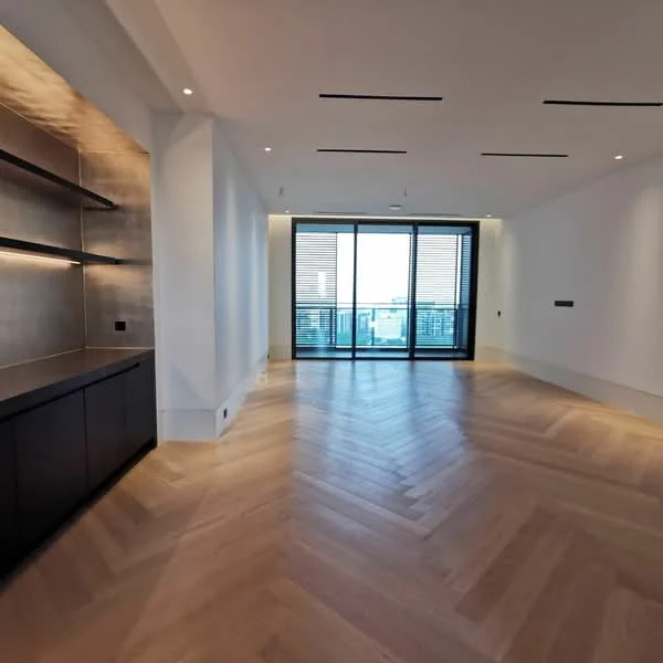 Living features: herringbone wood flooring, white painted walls, recessed downlights, floor-to-ceiling windows, black sliding glass door, open shelving, dark cabinetry, city view; style: modern; view: city.