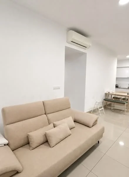 Living features: beige fabric sofa with cushions, wall-mounted split AC, white painted walls, glossy tile flooring, recessed lighting, open layout to kitchen, small side table, neutral color scheme; style: modern.