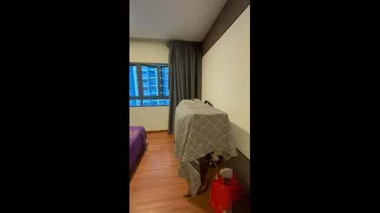 Room features: wooden flooring, grey curtains, large window, blanket covering furniture, painted walls, minimal decor; style: modern; view: city.