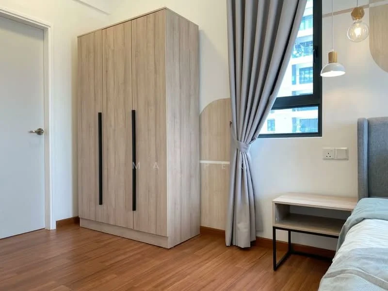 Bedroom features: wooden flooring, light wood wardrobe with black handles, bedside table with metal legs, grey upholstered headboard, window with black frame, curtains in light grey, pendant light fixture, decorative wall panel; style: modern.