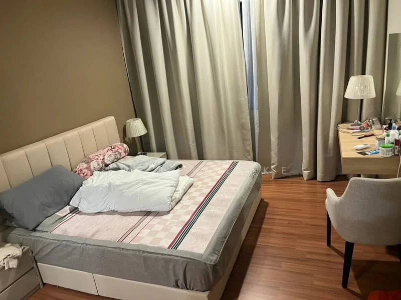 Bedroom features: queen-size bed with upholstered headboard, grey bedding, wooden flooring, floor-to-ceiling curtains in light grey, table lamp on bedside table, dressing table with mirror, upholstered chair, decorative items on dressing table; style: modern.