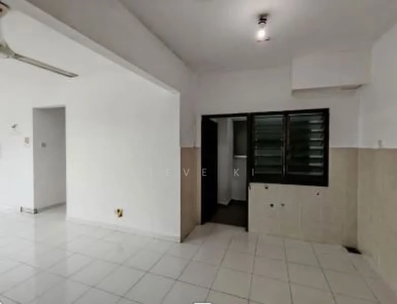 Room features: white painted walls, tile flooring, ceiling light fixture, window with louvered shutters, kitchenette area with tiled backsplash, open layout, corner wall with no visible features, doorway leading to another room; style: minimalist.