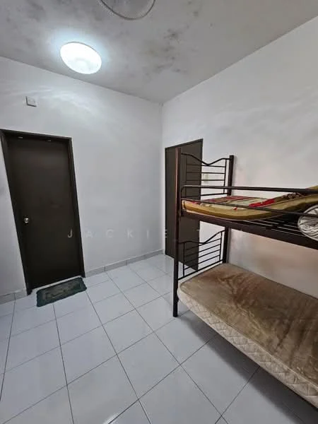 Room features: white painted walls, ceiling light fixture, bunk bed with mattress, tiled flooring, brown wooden door, black metal frame of bunk bed, green doormat, second door visible, plain ceiling; style: minimalist.