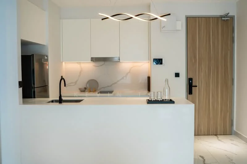 Kitchen features: white cabinetry, marble backsplash, black single-bowl stainless-steel sink, black gooseneck faucet, recessed lighting, pendant light fixture, built-in oven, stainless-steel refrigerator, white countertop, light marble flooring; style: modern.