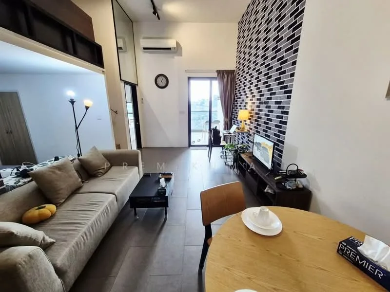 Living features: grey fabric sofa, black coffee table, wall-mounted TV, exposed brick accent wall, large window with city view, recessed downlights, floor-to-ceiling windows, laminate flooring, decorative clock, table lamp, dining table with wooden chairs, ceramic plates on the table; style: modern; view: city.