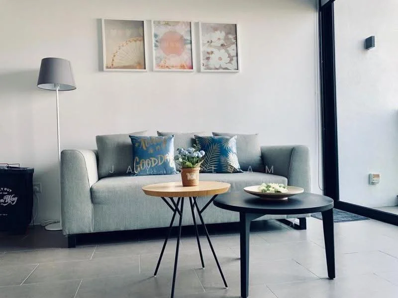 Living features: 3-seater fabric sofa in grey, decorative cushions with patterns, wooden coffee table with black legs, round wooden side table, floor lamp with grey shade, framed artwork on the wall, large glass window, tile flooring in light grey; style: modern.
