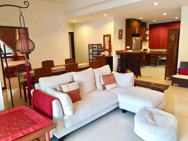 Living features: 3-seater fabric sofa in white, red accent pillows, coffee table, area rug, recessed downlights, wall-mounted decor, open layout to dining area, tile flooring; style: modern. Dining features: 6-seater wooden dining table, wooden dining chairs, decorative wall art, open layout to living area; style: modern. Kitchen features: stainless-steel fridge, built-in oven, kitchen island with bar stools, dark wood cabinetry, countertop with backsplash, recessed lighting; style: modern.