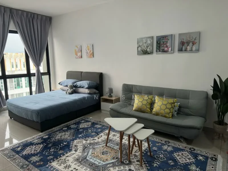 Room features: queen-size bed with grey upholstered headboard, grey fabric sofa bed, two accent pillows in yellow on sofa, white side tables with wooden legs, blue area rug with geometric pattern, floor-to-ceiling windows with sheer curtains, painted white walls, glossy tile flooring, decorative wall art with floral designs; style: modern; view: city.