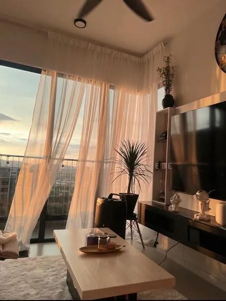 Living features: floor-to-ceiling windows, sheer curtains, 3-blade ceiling fan, wooden coffee table, black TV console, wall-mounted TV, decorative plant in pot, decorative items on console, area rug, natural light from sunset; style: modern; view: city.