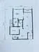 Floor plan: 2-bedroom 1-bathroom unit; features: open-plan kitchen-dining-living, master bedroom with ensuite bathroom, bedroom 2 with shared bathroom, utility room, balcony off living room, central foyer, 1 car porch.
