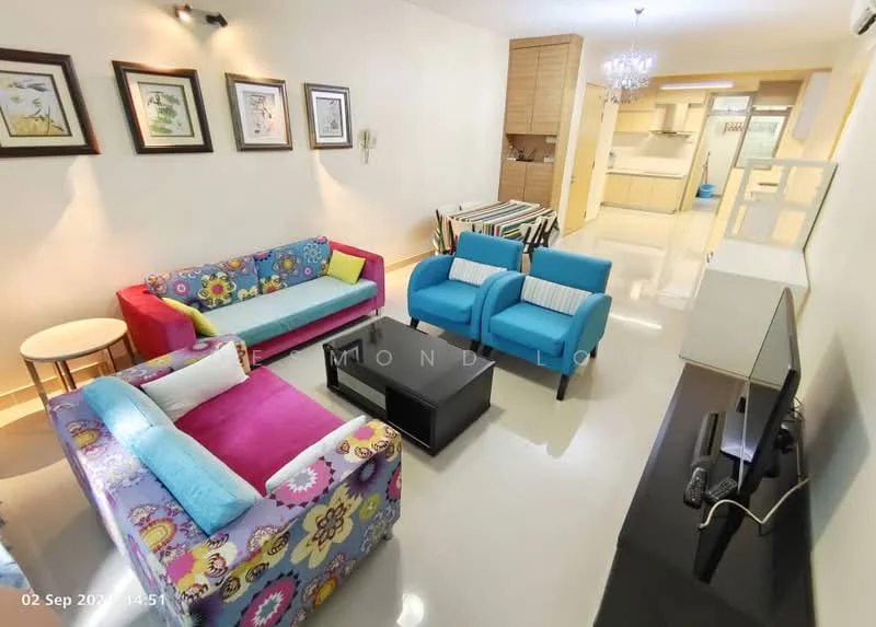 Living features: 3-seater fabric sofa in floral pattern, 2-seater fabric sofa in pink, 2 blue armchairs, black coffee table, wall-mounted TV, decorative wall art, recessed lighting, chandelier, cream painted walls, glossy tile flooring; style: modern. Kitchen features: open kitchen layout, kitchen island, wood cabinetry, white countertops, stainless-steel appliances, recessed downlights; style: modern.