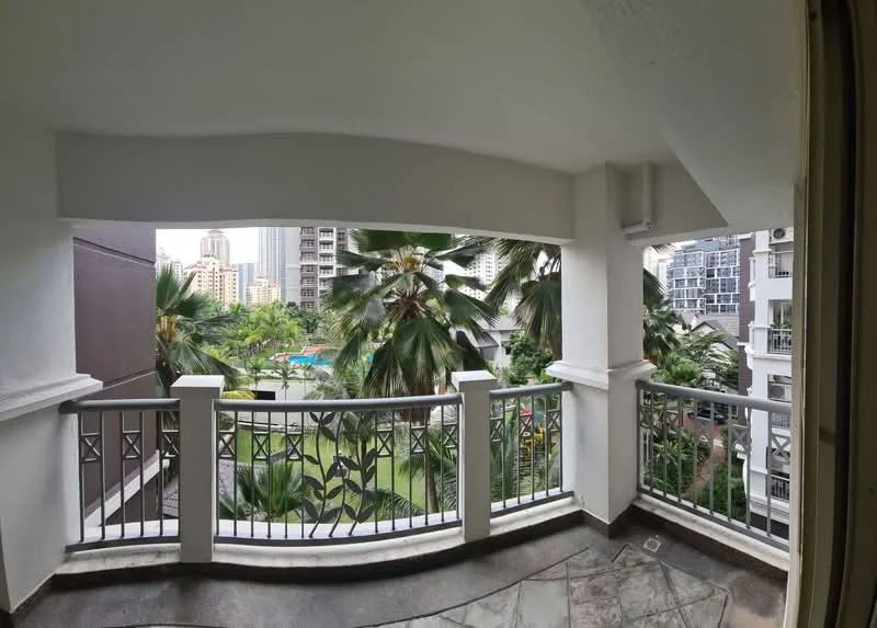 Balcony features: railing with decorative metalwork, stone flooring, overhead ceiling, view of landscaped garden, view of swimming pool, surrounding palm trees, city skyline in background; style: modern; view: garden.