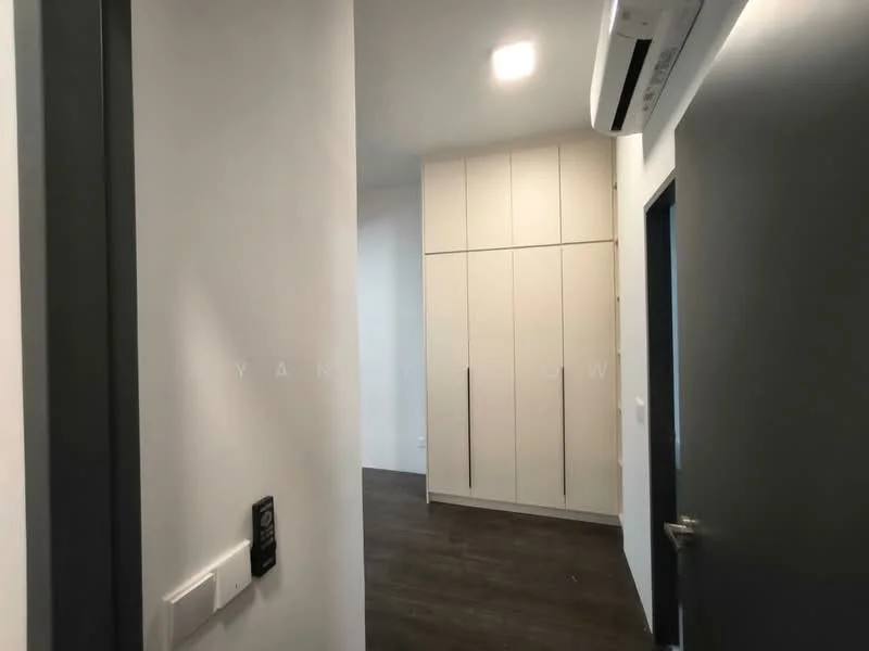 Room features: white painted walls, dark wood flooring, built-in wardrobe with white cabinetry, recessed ceiling lights, wall-mounted split AC, grey door, light switch, door frame; style: modern.