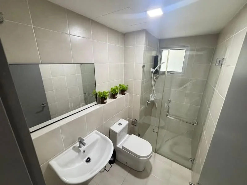 Bathroom features: white ceramic sink, chrome basin mixer, one-piece toilet, walk-in shower with glass enclosure, rain shower head, handheld shower, tile cladding on walls, light-colored tile flooring, framed mirror, window for natural light, potted plants on countertop; style: modern.