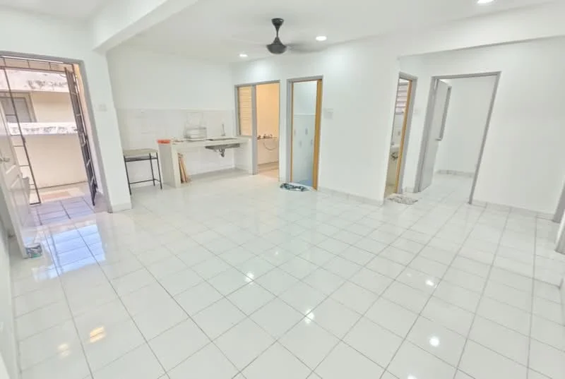 Room features: white painted walls, glossy white floor tiles, ceiling fan, open layout, kitchen area with wall-mounted sink, doorway leading to outdoor space, multiple doorways leading to other rooms, natural light from windows, neutral color scheme; style: modern.