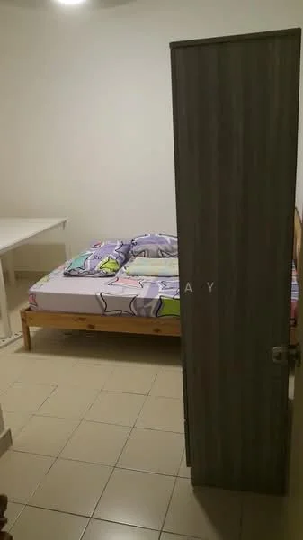 Bedroom features: single bed, bedding with cartoon pattern, wooden bed frame, white walls, tile flooring, small desk, wooden door, light ceiling fixture.