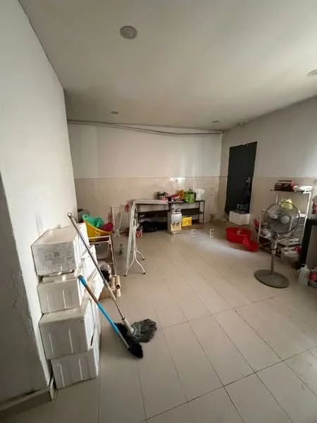 Room features: white painted walls, tile flooring, ceiling lights, fan, cleaning supplies, storage shelves, mop, broom, plastic containers, red buckets, metal table.