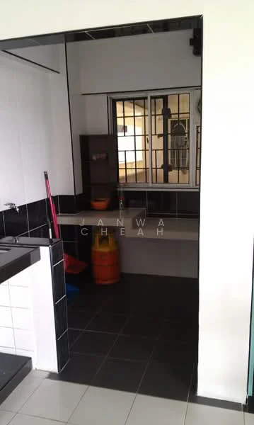 Kitchen features: black tiled backsplash, black countertop, white painted walls, black floor tiles, sink, kitchen cabinet, open shelving, cleaning supplies visible.