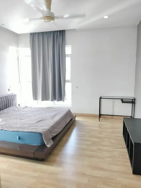 Bedroom features: queen-size bed, wooden bed frame, light wood flooring, floor-to-ceiling windows, grey curtains, ceiling fan, wall-mounted desk, black TV console, white painted walls, recessed lighting; style: modern; view: city.
