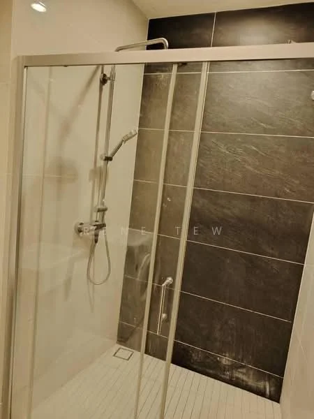 Bathroom features: walk-in shower with glass enclosure, chrome handheld shower, chrome wall-mounted shower head, white tiled flooring, black accent wall with tile cladding, white wall tiles, drain in floor, shower controls, glass shower door; style: modern.