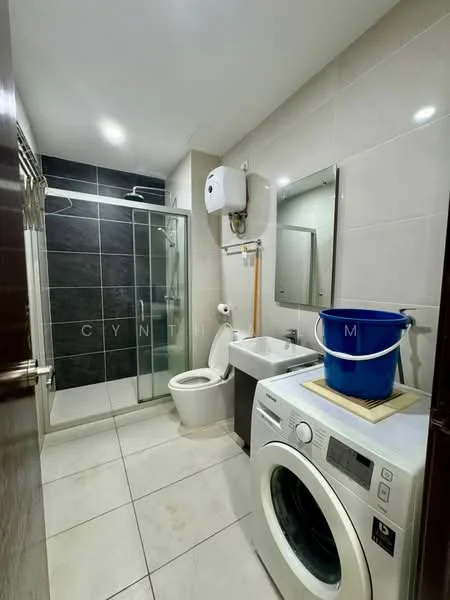 Bathroom features: glass shower enclosure, rain shower head, handheld shower, white toilet, single-sink vanity, mirror, washing machine, white ceramic sink, grey wall tiles, light grey floor tiles, water heater, bucket; style: modern.
