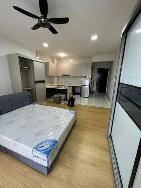 Bedroom features: queen-size bed with mattress protector, 5-blade ceiling fan, wooden flooring, built-in wardrobe, kitchenette with cabinets, stainless-steel fridge, stainless-steel sink, countertop with cabinets, recessed downlights, open layout, neutral wall color; style: modern.