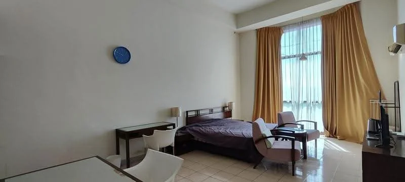 Room features: large floor-to-ceiling windows, sheer curtains, brown wooden bed frame, purple bedding, wooden dining table, white plastic dining chairs, two armchairs, wall-mounted air conditioning unit, light-colored tiled flooring, decorative wall clock, light brown wall paint, recessed lighting; style: modern.