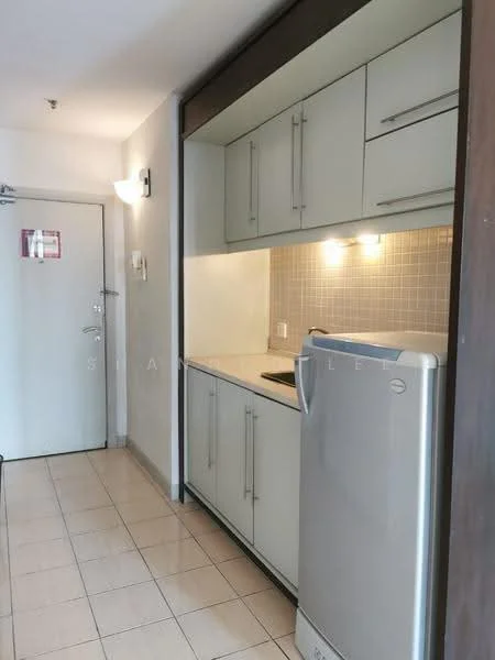 Kitchen features: white cabinetry with flat-panel doors, stainless-steel fridge, black countertop, tile backsplash in light grey, under-cabinet lighting, built-in sink, ceramic tile flooring, wall-mounted light fixture; style: modern. Room features: white painted walls, door leading to hallway.