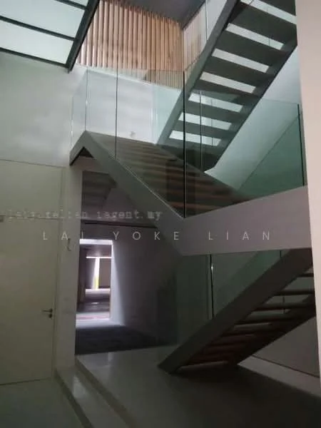 Room features: glass railing, wooden staircase, concrete flooring, high ceiling, natural light from skylight, minimalist design, neutral color palette, open space; style: modern.