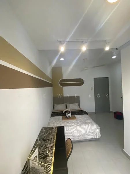 Bedroom features: queen-size bed with patterned bedding, decorative throw pillows, wall-mounted mirror, study desk with metallic finish, black chair, white painted walls with gold accent stripes, recessed LED downlights, ceiling fan, tile flooring, window with no visible treatment; style: modern.