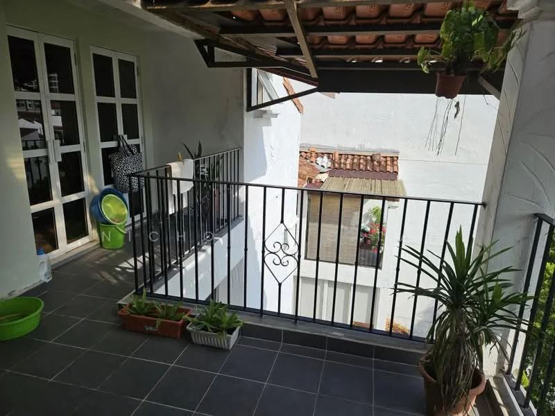 Balcony features: black metal railing, tiled flooring, potted plants, overhead wooden beams, white painted walls, clothes drying rack, green plant, decorative wall planters; style: modern; view: courtyard.