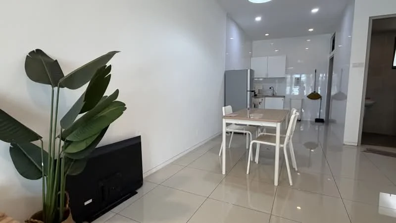 Dining features: white walls, glossy tile flooring, dining table for four, white dining chairs, indoor plant in pot, refrigerator, open kitchen layout, ceiling lights; style: modern. Kitchen features: white cabinetry, stainless-steel appliances, countertop, sink, open layout to dining area; style: modern.