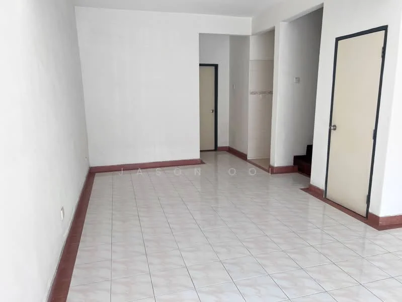 Room features: white painted walls, glossy ceramic tile flooring, single door, door frame, staircase visible in background, neutral color scheme, no visible furniture, large open space; style: minimalist.