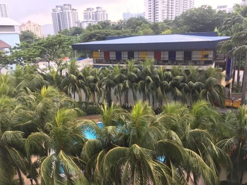 Exterior type: swimming pool deck; features: lush palm trees, swimming pool, manicured landscaping, multi-storey residential buildings in background, blue roof on adjacent building, colorful facade on adjacent building; style: modern.