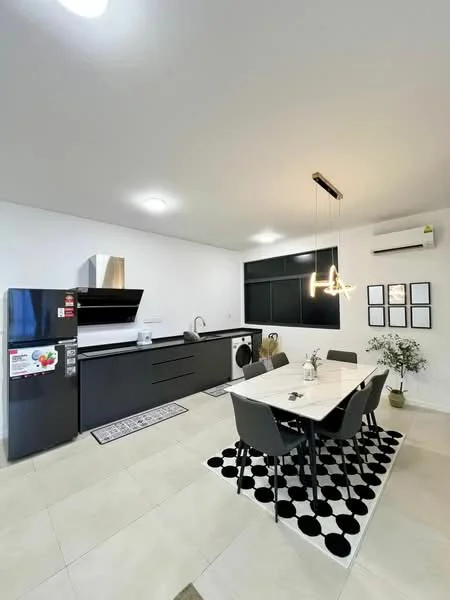 Kitchen features: black cabinetry, white countertop, stainless-steel sink, chrome pull-down faucet, built-in oven, stainless-steel range hood, fridge, 4-burner gas hob, pendant light, recessed downlights, dining table with white top, 4 upholstered dining chairs, black and white area rug, wall-mounted split AC; style: modern.