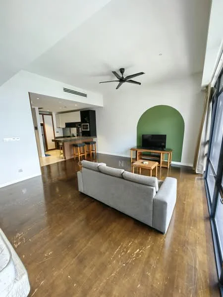 Living features: grey fabric 3-seater sofa, wooden coffee table, wall-mounted TV, ceiling fan with light, wooden flooring, green accent wall, large windows with natural light, open layout to kitchen, recessed ceiling, neutral wall color; style: modern.