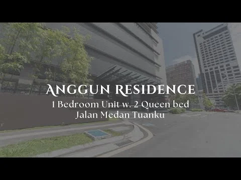 Exterior type: high-rise condominium; features: glass curtain wall, concrete facade, recessed balconies, modern architectural design, surrounded by mature greenery, urban context with nearby buildings; style: modern.