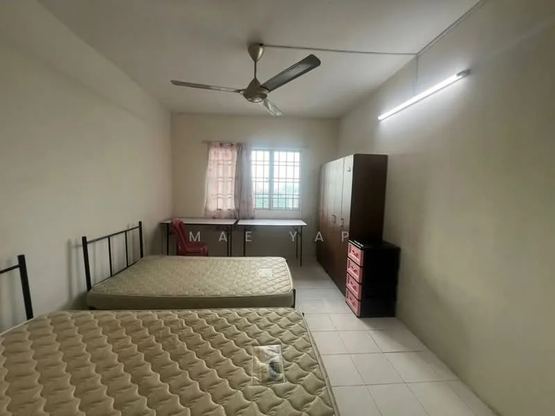 Bedroom features: two single beds with mattresses, ceiling fan, window with sheer curtains, built-in wardrobe with wooden finish, pink dresser, white tiled flooring, plain painted walls, light fixture on ceiling.