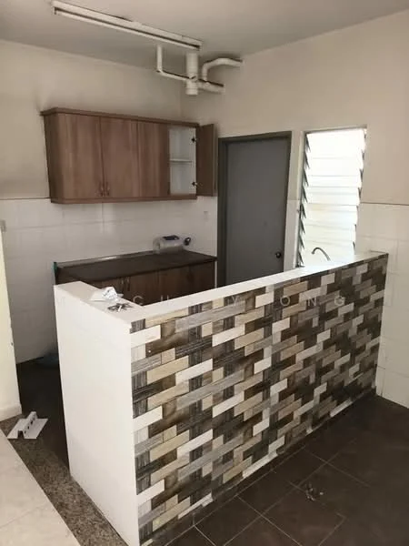 Kitchen features: wooden upper cabinets, brown lower cabinets, white tiled backsplash, decorative patterned tile on counter, single-bowl stainless-steel sink, chrome faucet, window with horizontal slats, counter space, floor tiles with dark color, open layout to living area; style: modern.