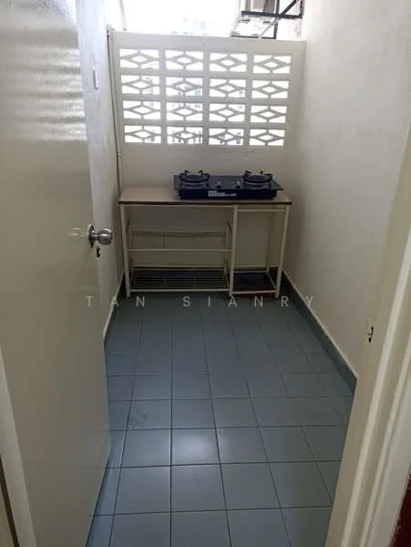 Room features: grey tiled flooring, white painted walls, countertop with storage underneath, two-burner gas stove, ventilation window, open layout, wall-mounted shelf.