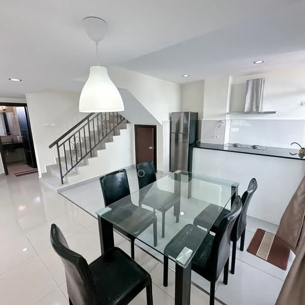 Dining features: glass dining table with black legs, 6 black dining chairs, white pendant light, white walls, tile flooring, stainless-steel fridge, black countertop, kitchen area visible in background, stainless-steel range hood, built-in stove, open-plan layout, staircase in background; style: modern.