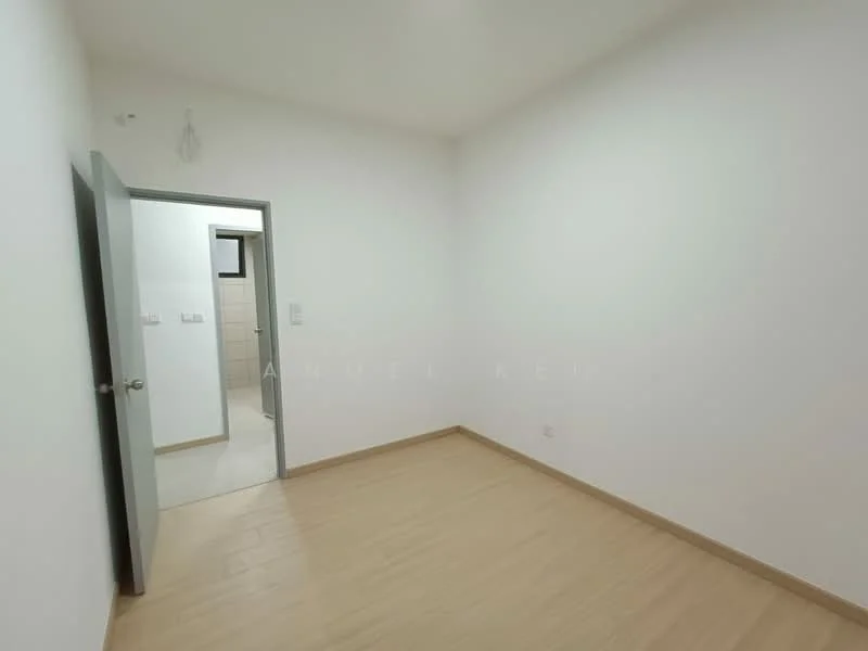 Room features: white painted walls, light wood laminate flooring, single light fixture on ceiling, doorway leading to bathroom, neutral color scheme.
